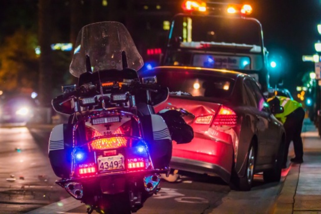 police motorcycle at a car accident scene